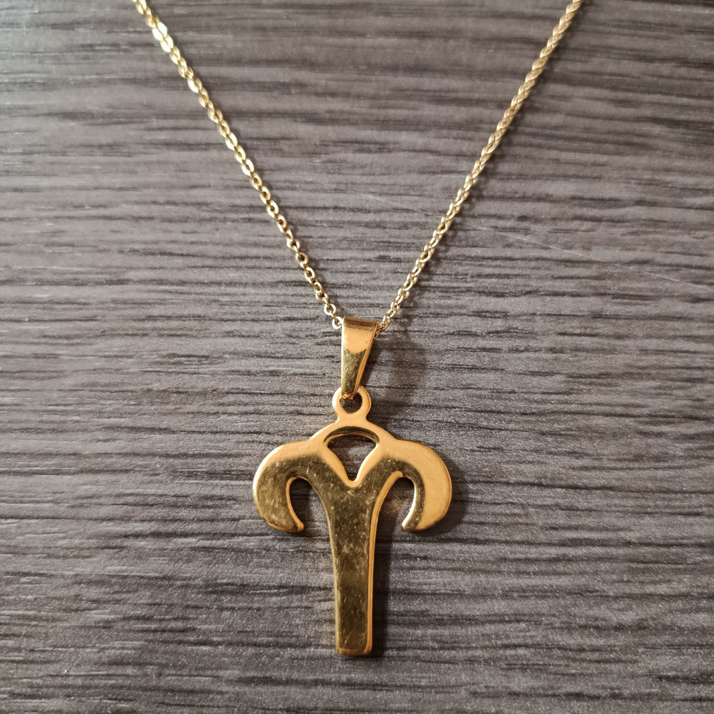 Collar acero dorado Aries