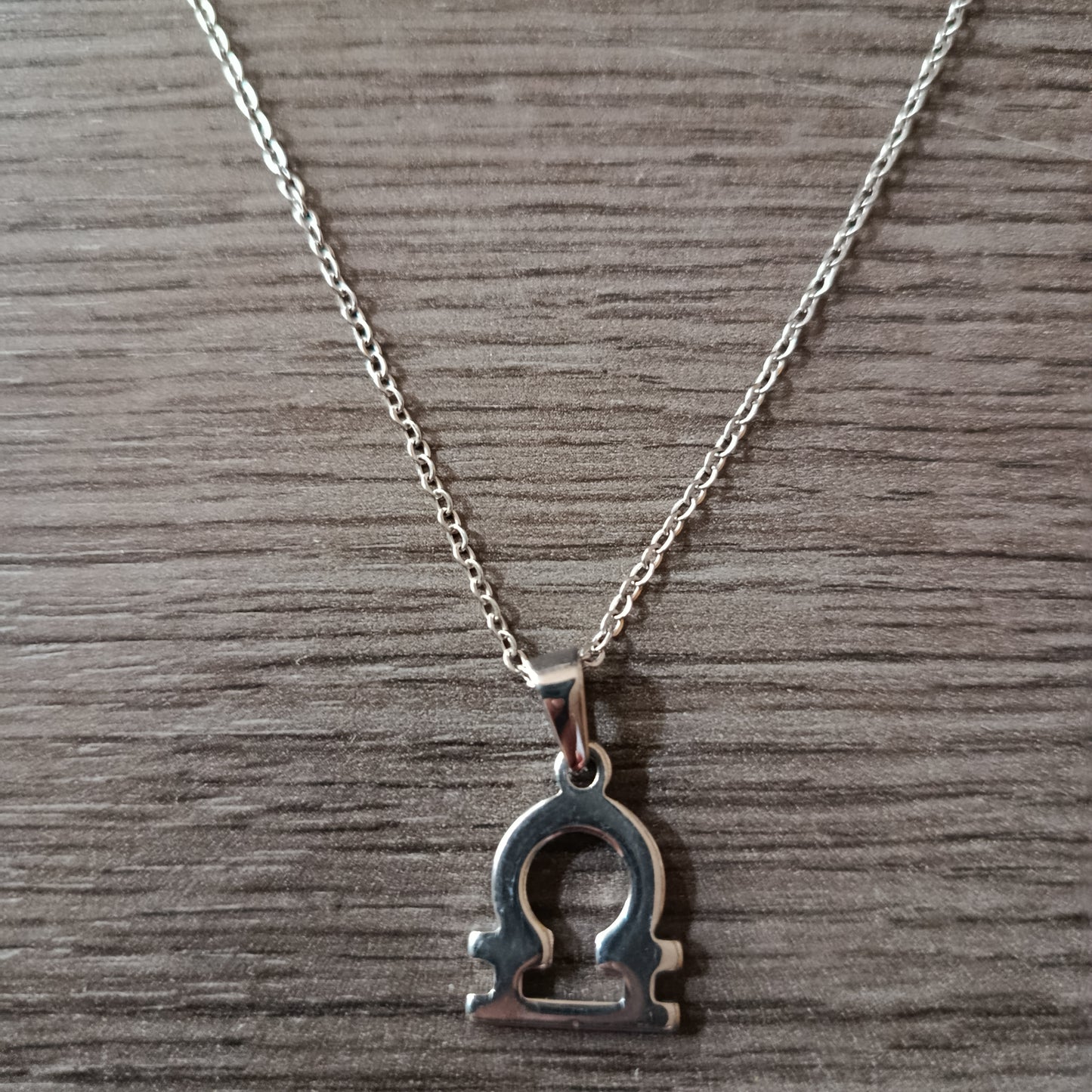 Collar acero Libra