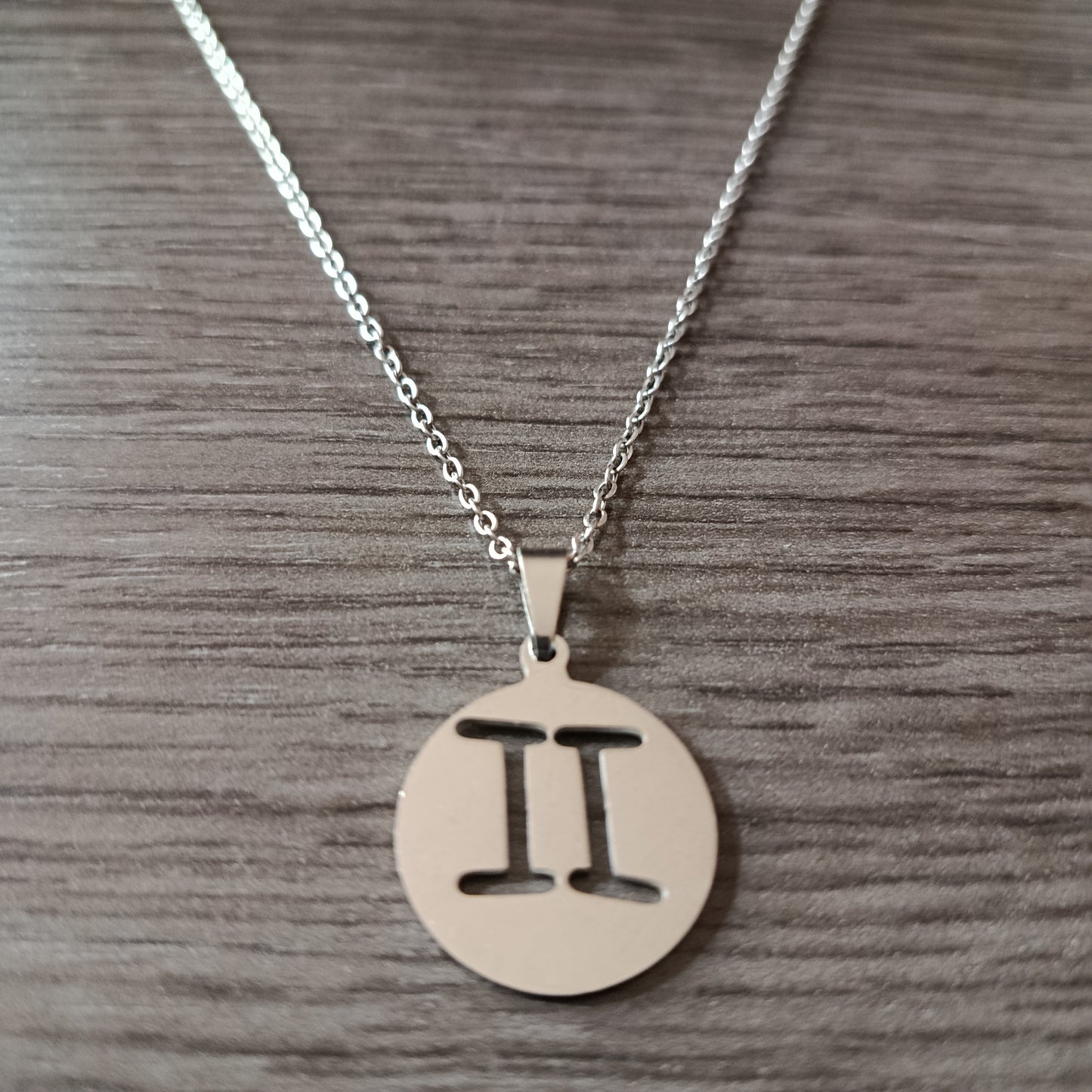 Collar acero medalla Geminis